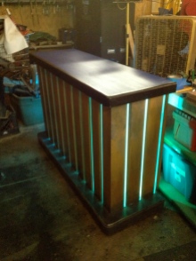LED backlighting on Rosario's Car Service counter from In The Heights